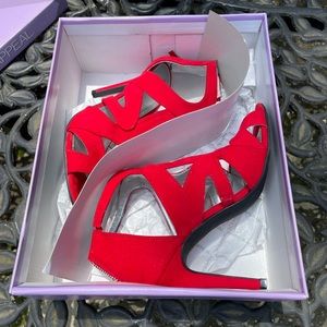 Woman’s red heels